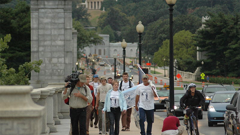 activists walking down the street